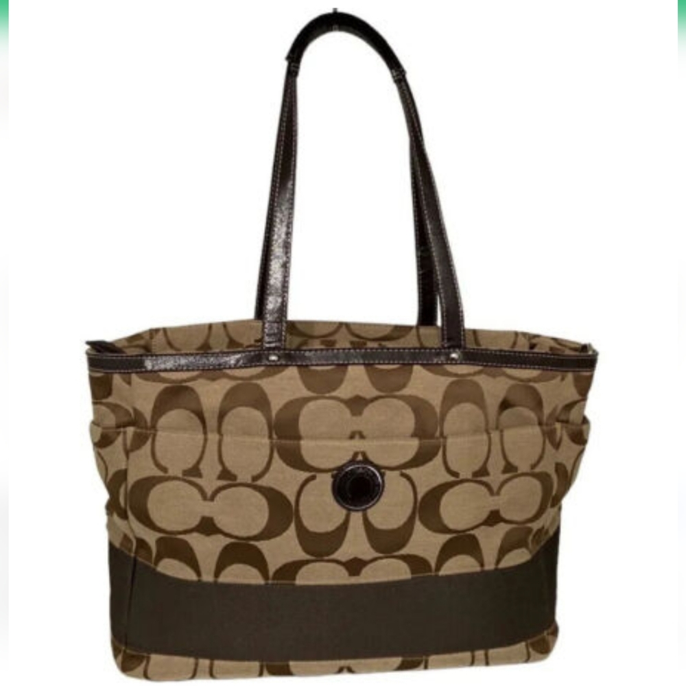 Coach Signature "C" purse with satin accents and patent leather straps.